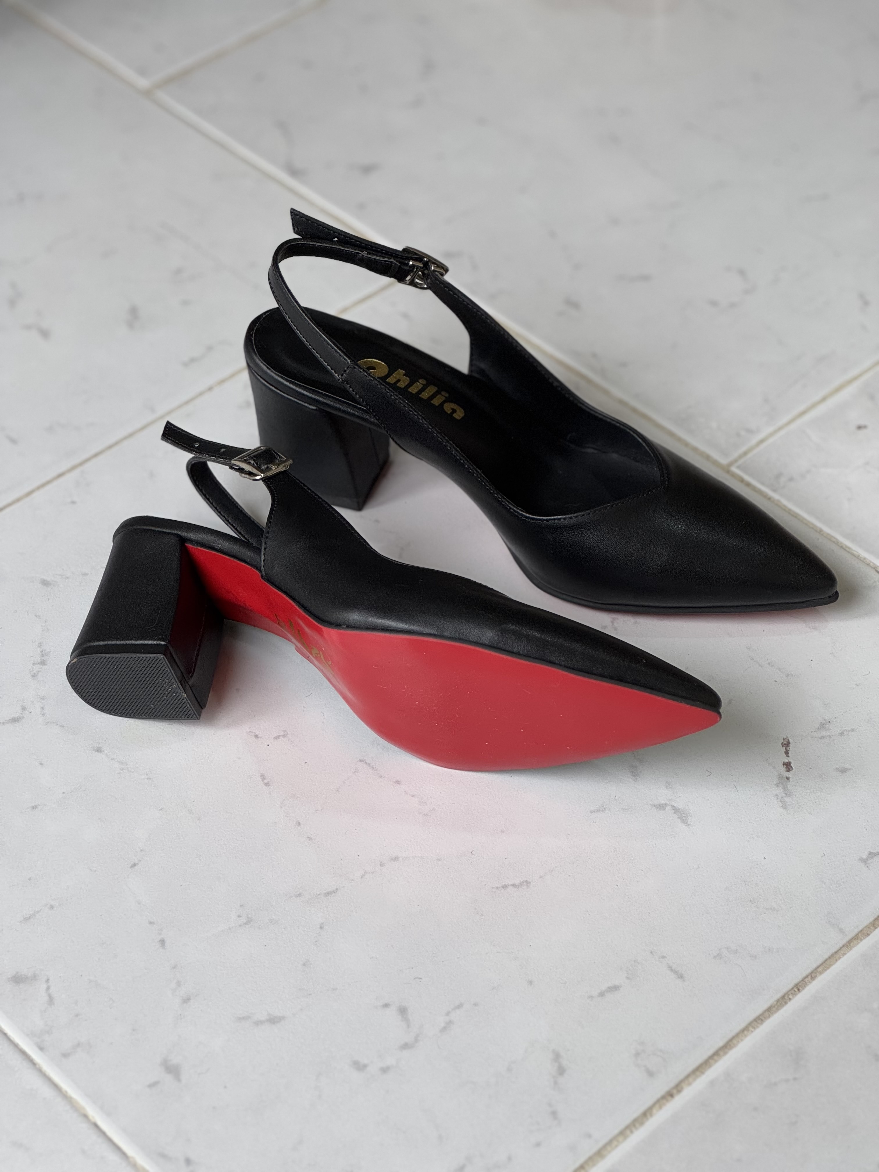 کفش مشکی زیره قرمز